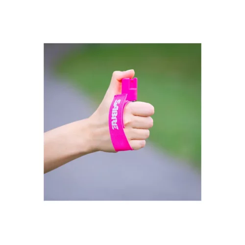 Sabre Dog Attack Deterrent - 22g with Hand Strap in use