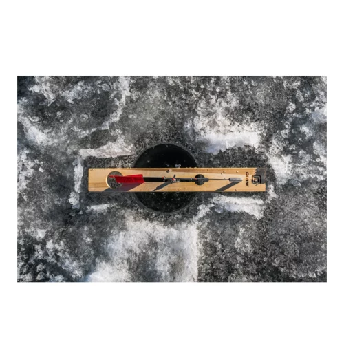 Lunker Deluxe Tip up over ice hole